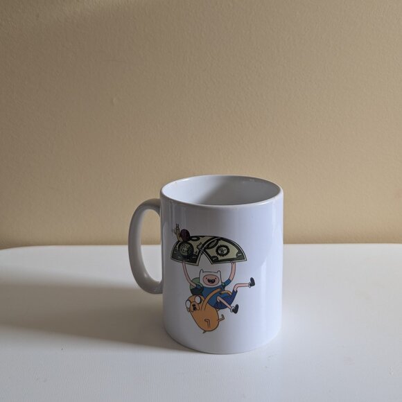 ADVENTURE TIME FINN AND JAKE MONEY MUG - Picture 1 of 3